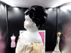 china head beige dress side face